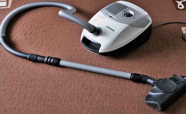 vacuum cleaner on the carpet